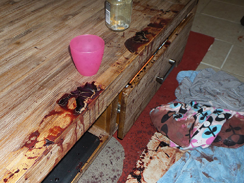 Blood on a table cleaning process by Trauma Cleaner Australia